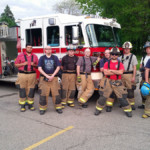 Firefighter crew with Engine 28-13 after training on preconnected attack lines
