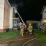 Firefighters continue overhaul at a structure fire on Market St