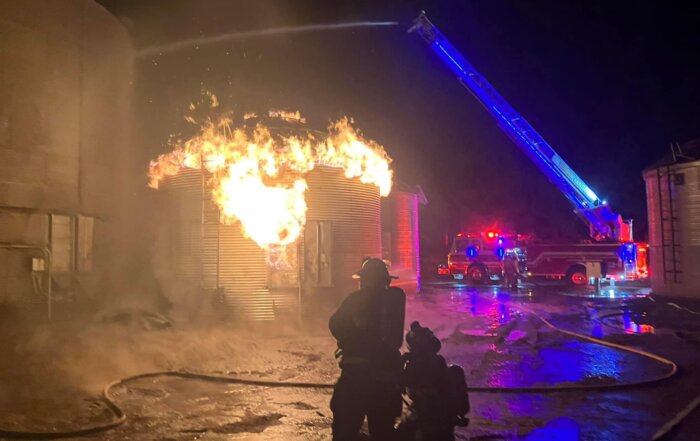 West Mead 1 firefighters assist in attacking a silo fire