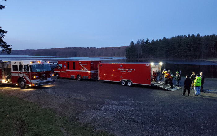 Engine 28-13 and Crawford County Scuba Team's dive truck and trailer during an animal rescue effort on Tamarack Lake