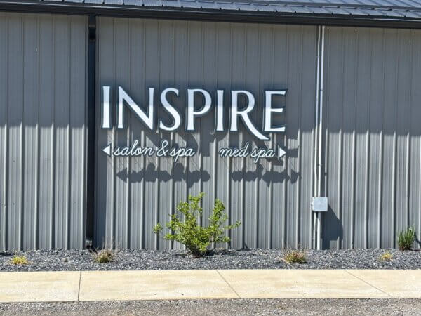 Inspire Salon exterior with sign